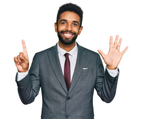 Young african american man wearing business clothes showing and pointing up with fingers number six while smiling confident and happy.