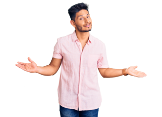 Handsome latin american young man wearing casual summer shirt smiling showing both hands open palms, presenting and advertising comparison and balance