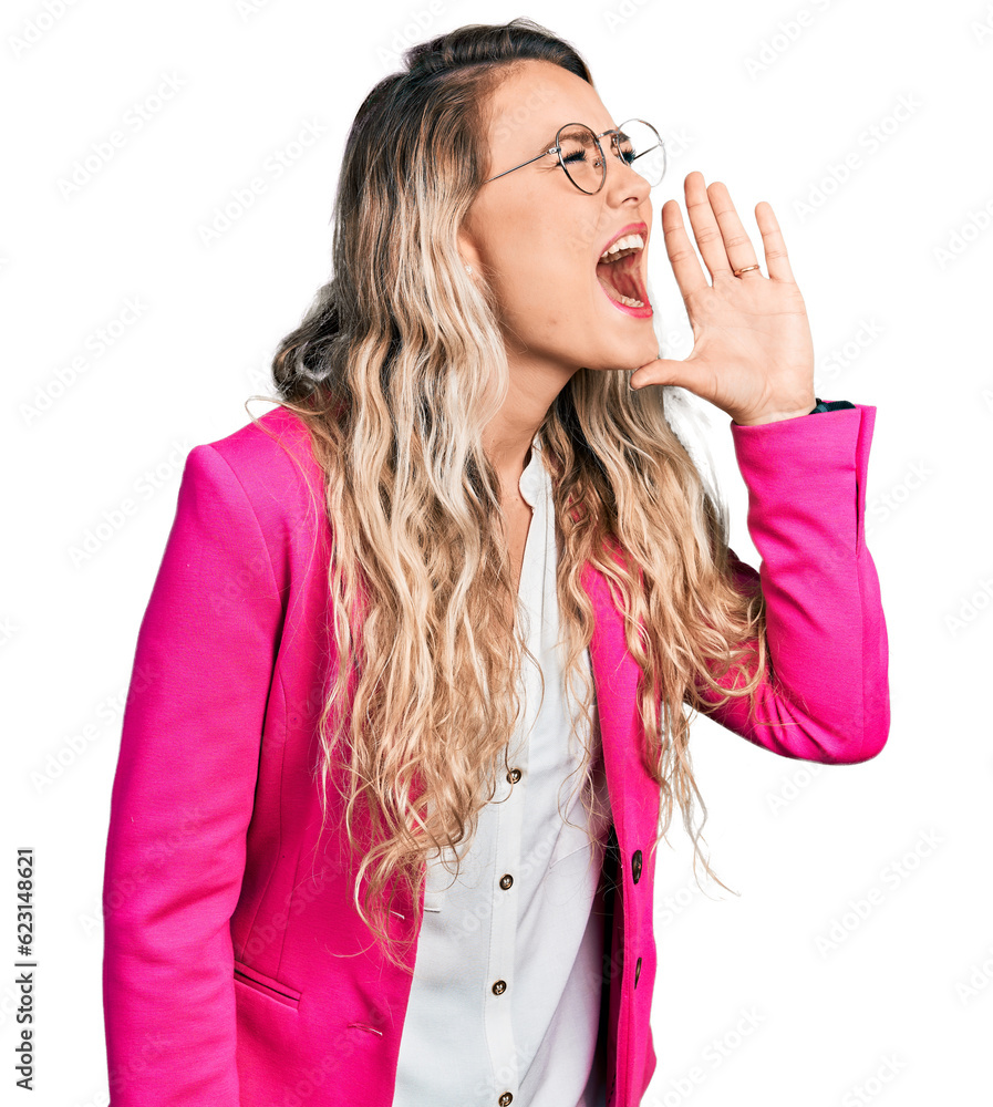 Canvas Prints young blonde woman wearing business style and glasses shouting and screaming loud to side with hand 