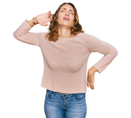 Beautiful young caucasian woman wearing casual sweater stretching back, tired and relaxed, sleepy and yawning for early morning