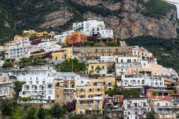 Fototapeta na wymiar Closeup of Positano, a village and comune on the Amalfi Coast in Campania, Italy, an enclave in the hills leading down to the coast