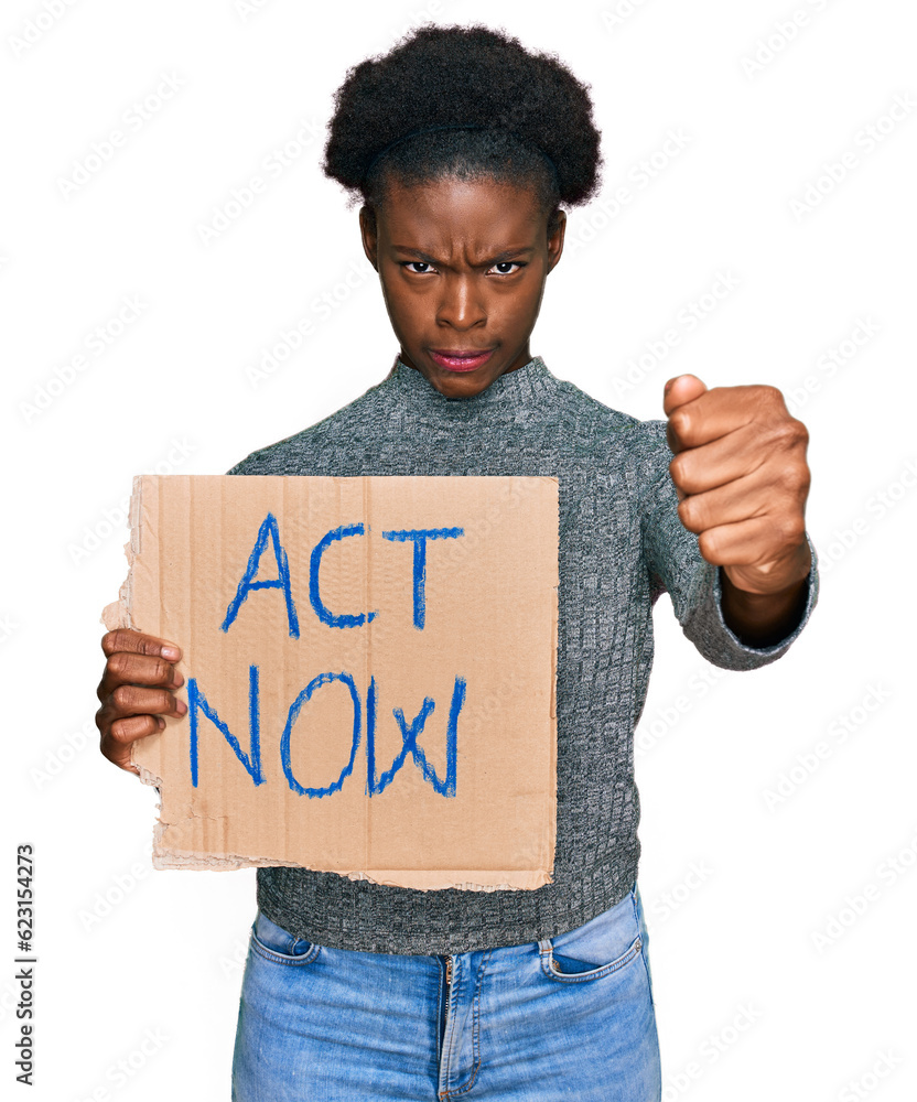 Sticker Young african american girl holding act now banner annoyed and frustrated shouting with anger, yelling crazy with anger and hand raised