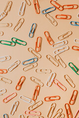 Paper clips as a background. Back to school concept. Place for text.