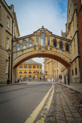 Fototapeta na wymiar Hertford Bridge known as the Bridge of Sighs, is a skyway joining two parts of Hertford College, Oxford, UK