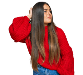 Beautiful hispanic woman wearing casual clothes confuse and wondering about question. uncertain with doubt, thinking with hand on head. pensive concept.