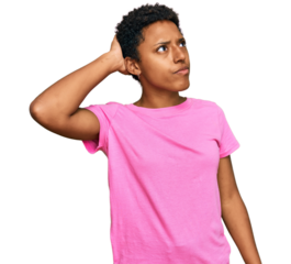 Young african american woman wearing casual clothes confuse and wondering about question. uncertain with doubt, thinking with hand on head. pensive concept.