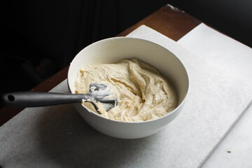 cake batter in a white bowl, cake batter in a white ceramic bowl, the process of making pound cake