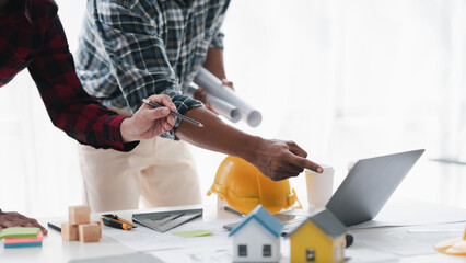 Creative Engineer and Architect Meeting for Collaborative Design and Project Planning in the Workplace.