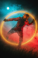 Spaceman in the spacesuit and helmet walks through portal on the alien planet concept. Space explorer.