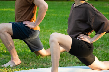 fitness couples stretching. lovely sports. fitness outdoor. family gymnastic. yoga outdoor.