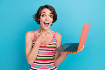 Photo of crazy surprised girl bob brown hair wear trendy top hold laptop point finger high quality...