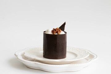 Chocolate Mousse Cake topped with walnut