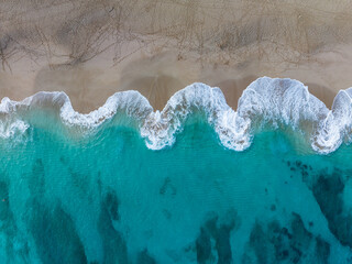 Aerial of waves on beach