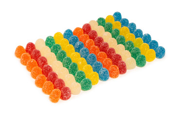 Assorted colorful gummy candies isolated on a white background.