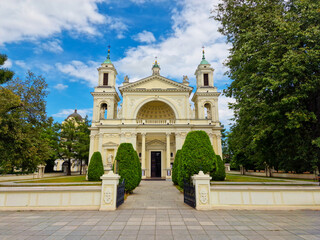 Fototapeta na wymiar WARSAW, WILANOW, POLAND July 11, 2023 : Church of St. Anna (garrison church of the peasant battalions) at Wilanow district in Warsaw. Poland