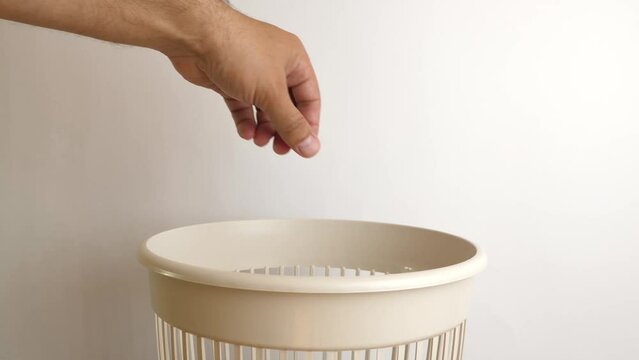 Old batteries are recycled and thrown into the trash. The concept of disposal and recycling of waste.