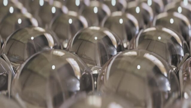 Reflective glass mirror spheres looping video. Refraction in glass. High quality 4k footage