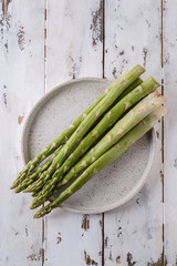 asparagus on a white wooden background
