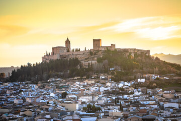 Scenic white village of Alcala la Real near Granada sunset view