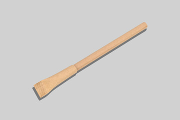 Pen made from environmental recycled paper on grey background. Mock up for branding. Eco concept.