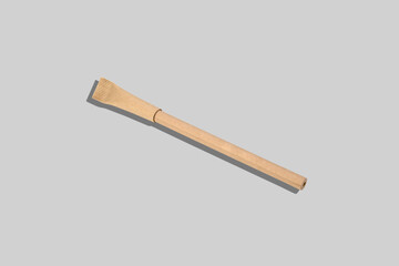 Pen made from environmental recycled paper on grey background. Mock up for branding. Eco concept.