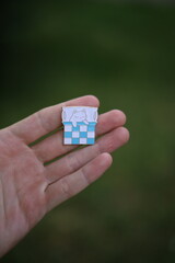 pin with can in hand