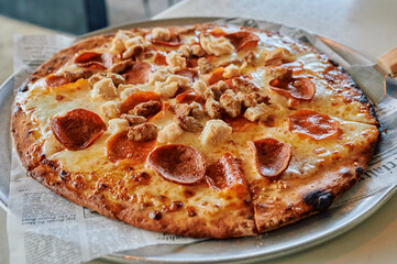 howl pizza on a table