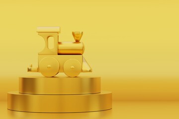 Golden steam locomotive on a podium on a yellow background