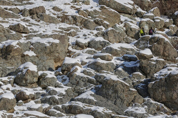 A view of the climbing route from Darband to Tochal peak can be seen in the early hours of the morning. Mountaineers are walking on this path.