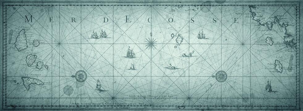 Old map collage background. A concept on the topic of sea voyages, discoveries, pirates, sailors, geography, travel and history. Pirate, travel and nautical background.