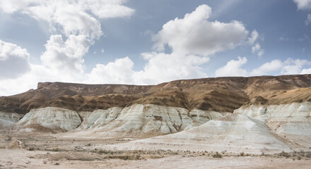 Layered hills of the Ustyurt plateau in the steppe of lime, chalk and sand, the ancient bottom of the Tethys ocean