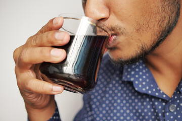 men drinking soft drinks closeup 