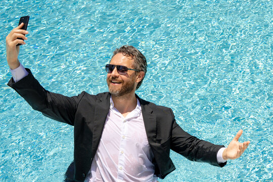 Hot excited business. Funny excited office worker. Business man in suit work online in beach. Travel and business. Crazy excited office worker. Excited businessman on summer vacation distance work. - Powered by Adobe