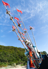 Fishing trawler in the sea on a background of blue sky © jarizPJ
