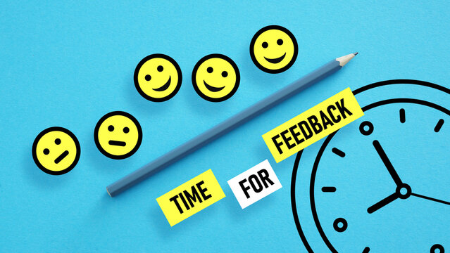 Time for feedback is shown using the text and picture of clock and icons of smiley faces