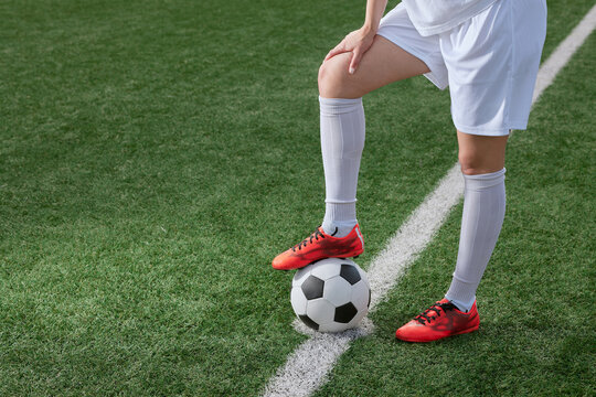 Sports Girl Football Player With A Soccer Ball On The Soccer Field, The Concept Of Professional Women's Football