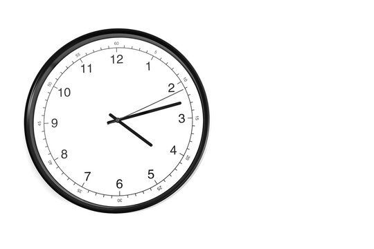 Part of analogue plain wall clock on white wall background. Four o'clock twelve minutes. Close up with copy space, timing, time management, opening hours time, school concept and lunch time.