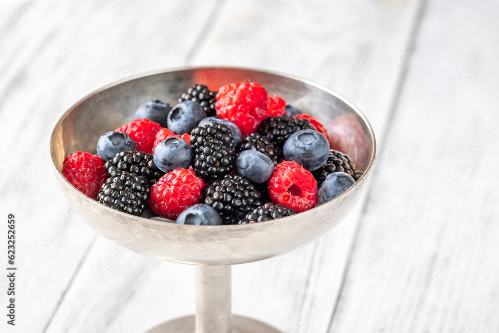 Poster fresh berries in silver vase