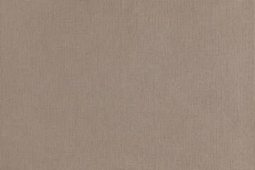 Texture background of brown cotton fabric. Textile structure, cloth surface, weaving of linen fabric closeup, backdrop, wallpaper.