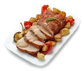 sliced roast pork with vegetables and sauce