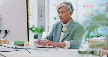 Computer, thinking and senior business woman writing in office for planning, idea or research. Online, solution and elderly lady manager checking schedule, plan or proposal with management book notes