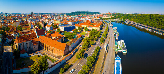 Aerial view of Prague, a capital city of the Czech Republic, is bisected by the Vltava River, Europe - obrazy, fototapety, plakaty