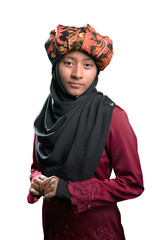 A young malay teenager girl wearing a traditional Negeri Sembilan costume isolated on white background