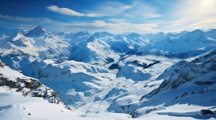 Fototapeta premium View from Mt. Titlis in the Swiss Alps in winter. Mount Titlis is a mountain, located on the border between the Swiss Cantons of Obwalden and Bern