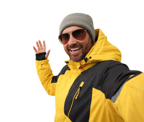 Smiling man in hat and sunglasses taking selfie on white background