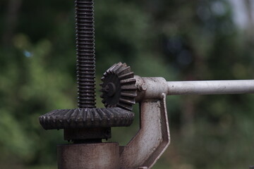 a tool to regulate the discharge of water at the sluice gates of irrigation canals