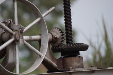 a tool to regulate the discharge of water at the sluice gates of irrigation canals