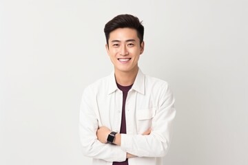 Portrait of happy young asian man in white shirt, isolated on white background