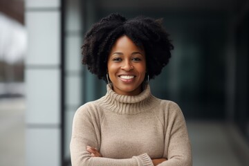 Portrait of a smiling african american businesswoman with arms crossed