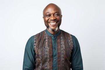Obraz premium Portrait of happy mature african american man smiling at camera